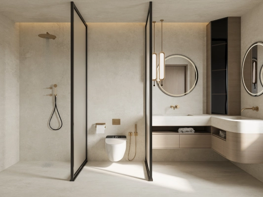A modern, clean, and easy-to-maintain commercial restroom with wall-hung fixtures.