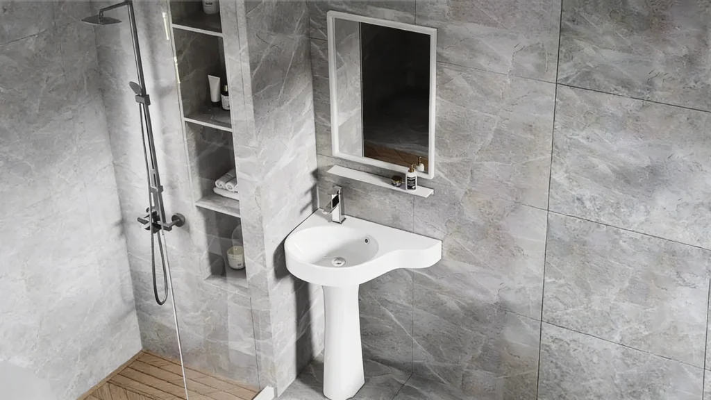 Compact pedestal sink in a small luxury hotel bathroom with wall-mounted faucet, light-colored tiles, and open floor space for an airy feel.