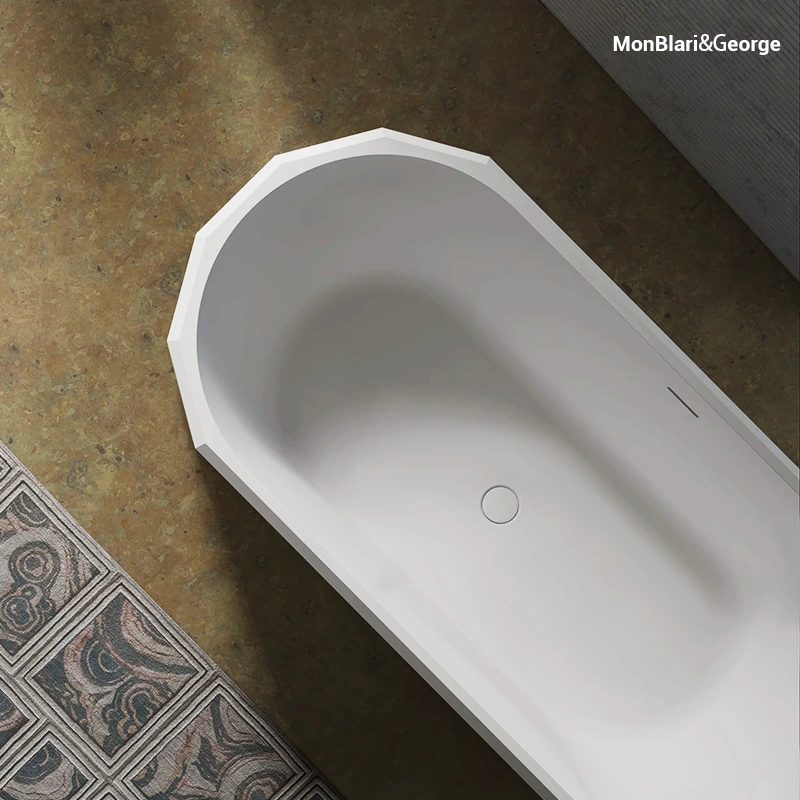 BERYL series solid surface bathtub with superior heat retention, featuring a sharp avant-garde exterior and a supportive ergonomic interior basin.