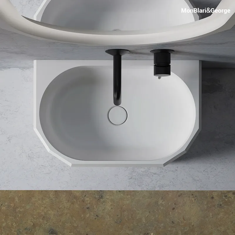 Sculptural multi-faceted basin with a prism-inspired geometric exterior that creates a sophisticated interplay of light and shadow.