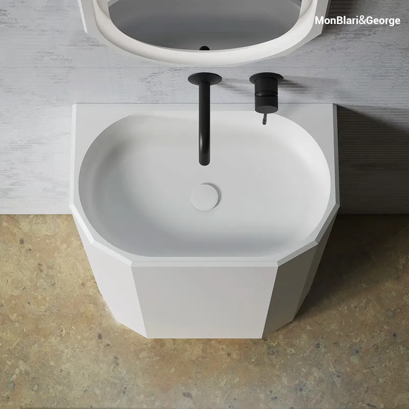 Floating wall-mounted pedestal sink with architectural geometric design.