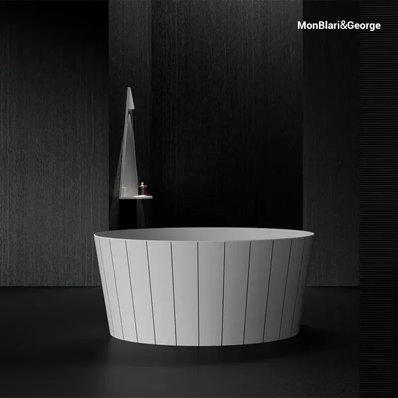 Shop Model S-0821 luxury round freestanding tub in use — sculptural matte white solid surface with intersecting conical geometry, deep ergonomic soaking design creating a serene, spa-like bathing experience; MUSE Design Award winner.