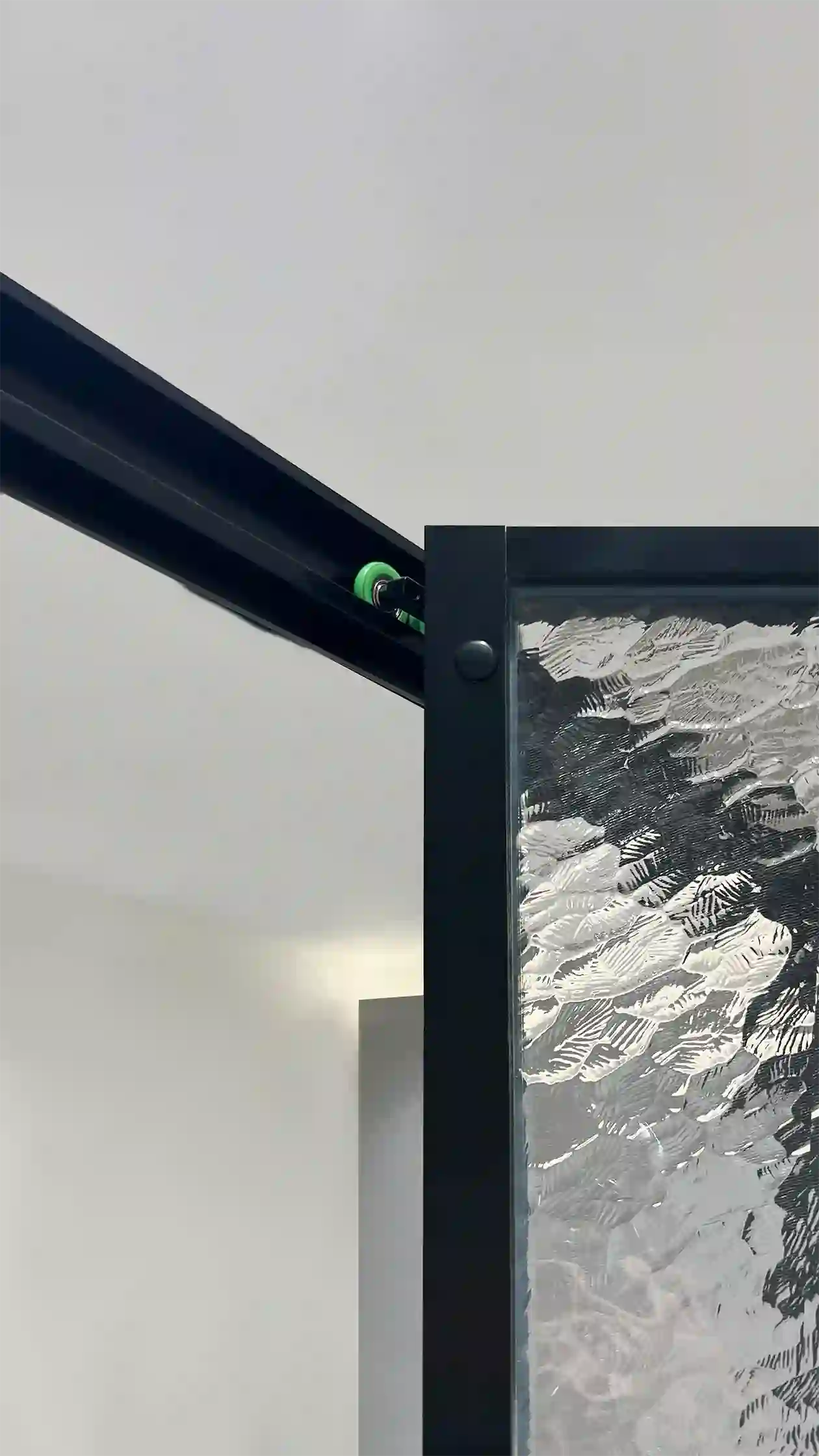 FS12821 matte black corner shower enclosure sliding door showing high-polymer guide wheels, rubber pulleys, and nano easy-clean top track for smooth, quiet operation.