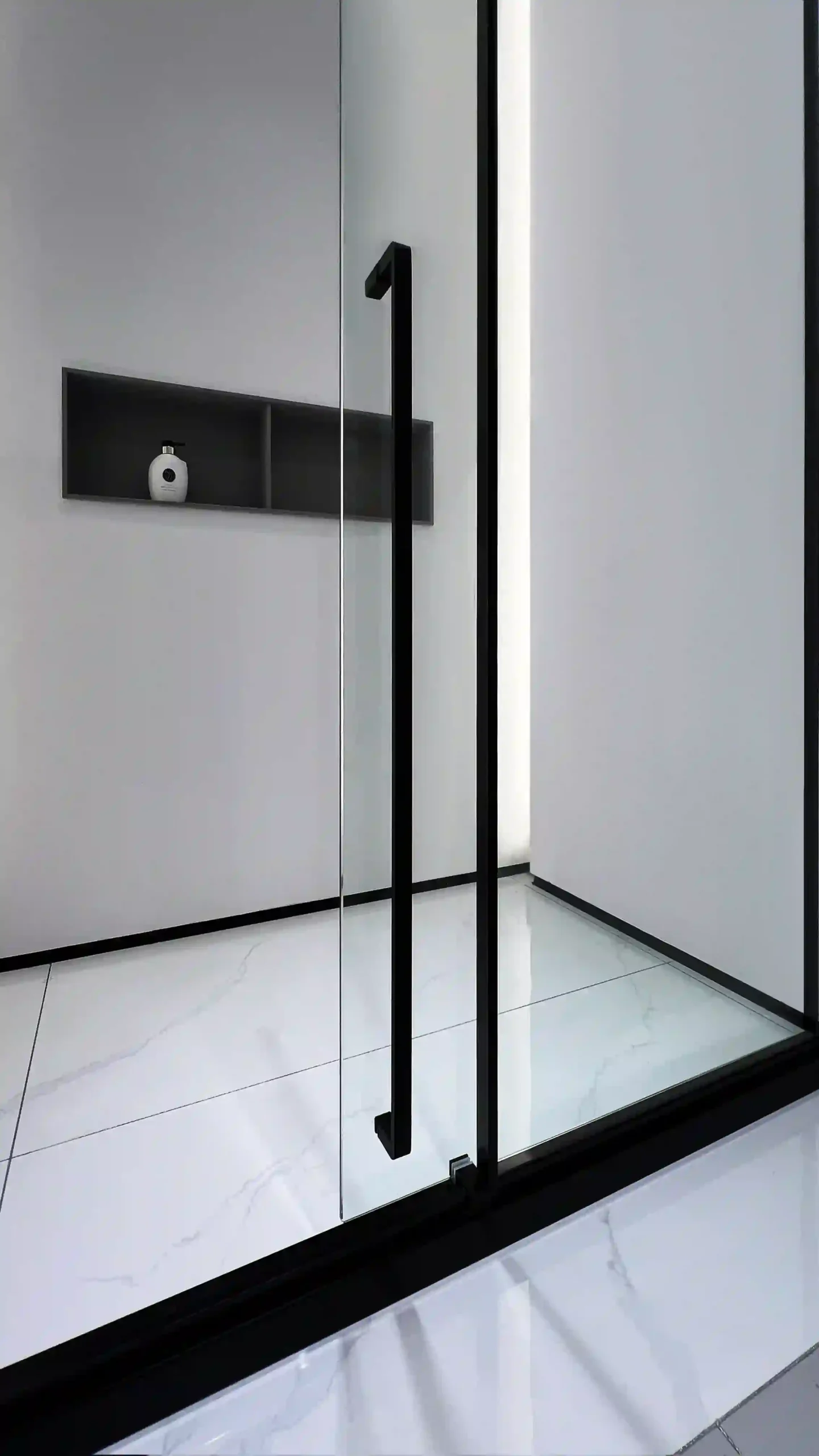 Matte black framed sliding glass shower door with fixed panel, featuring a 1-meter extended family handle and easy-clean minimalist glass design. Select 77 more words to run Humanizer.
