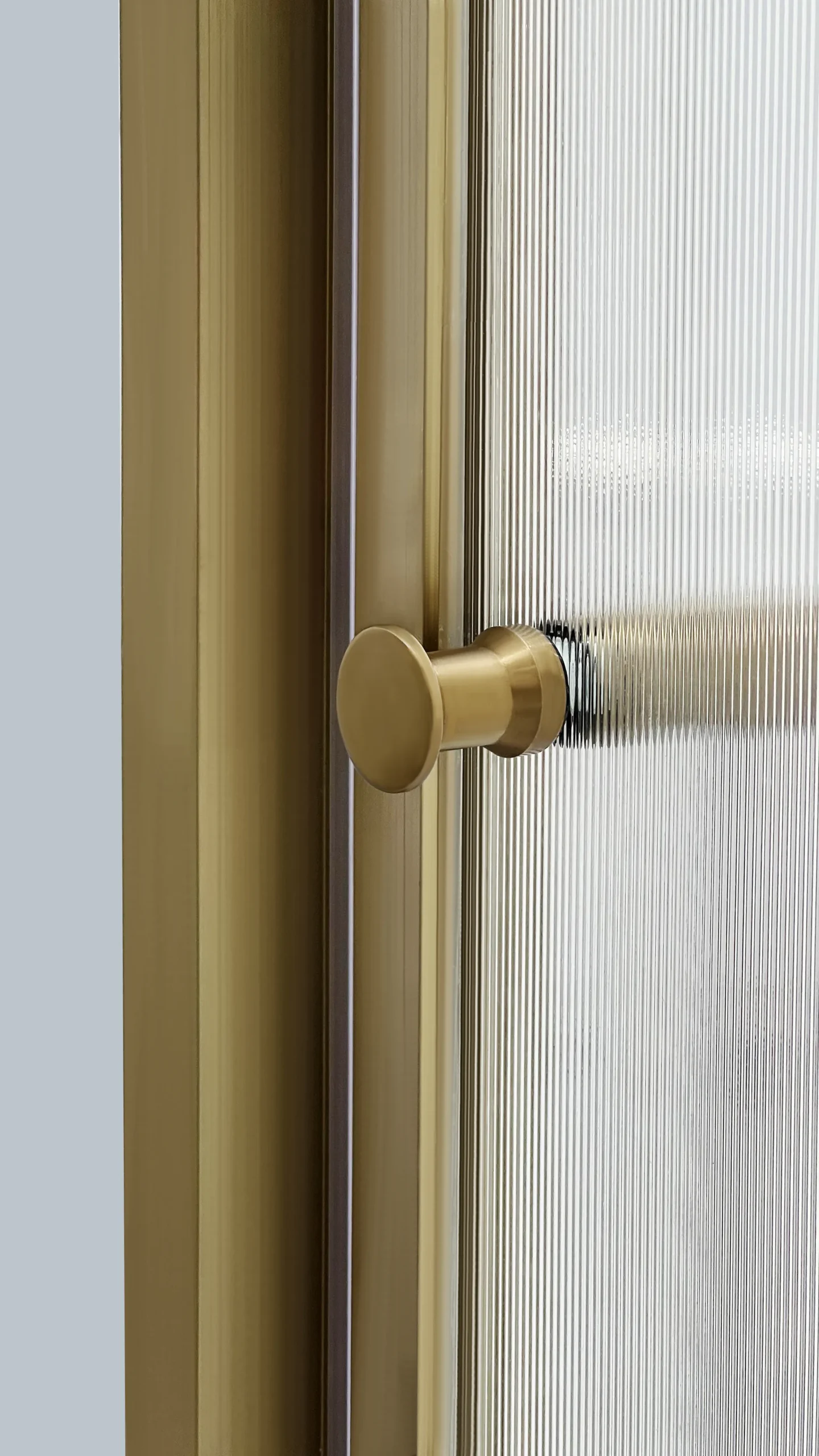 ZS15921 neo-angle shower enclosure with ultra-clear fluted tempered glass and brushed-gold 304 stainless steel frame, combining privacy, luxury, and modern design.