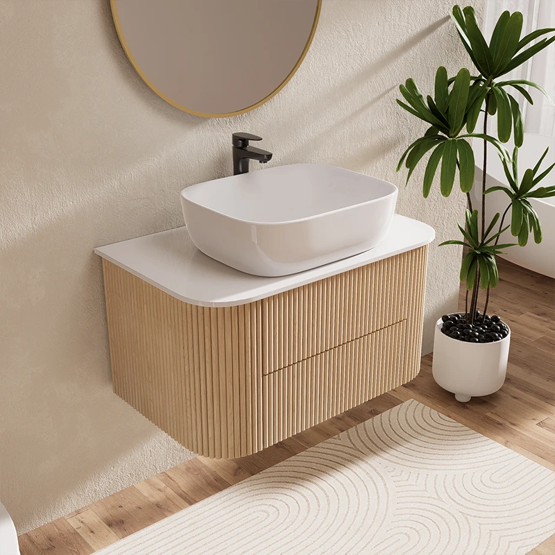 Upgrade hotels with this 31.5" floating vanity. Fluted wood & sintered stone offer durability and easy cleaning for high use.