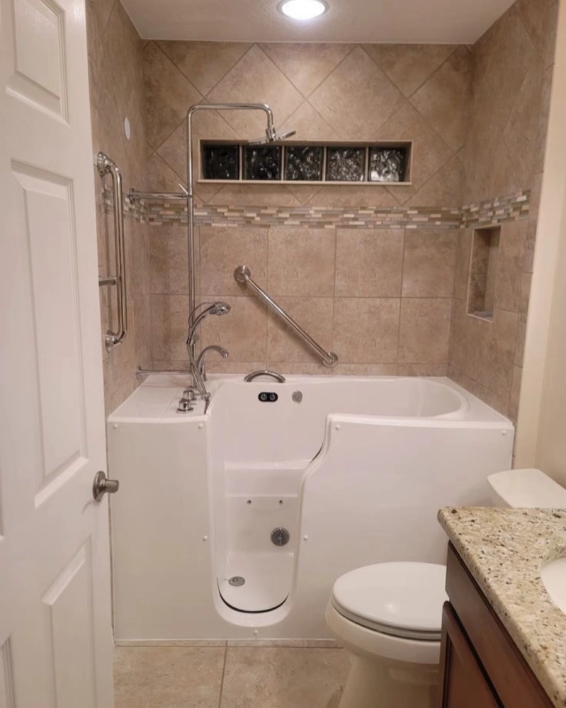 Medical-grade bathtub with automated patient lift seat