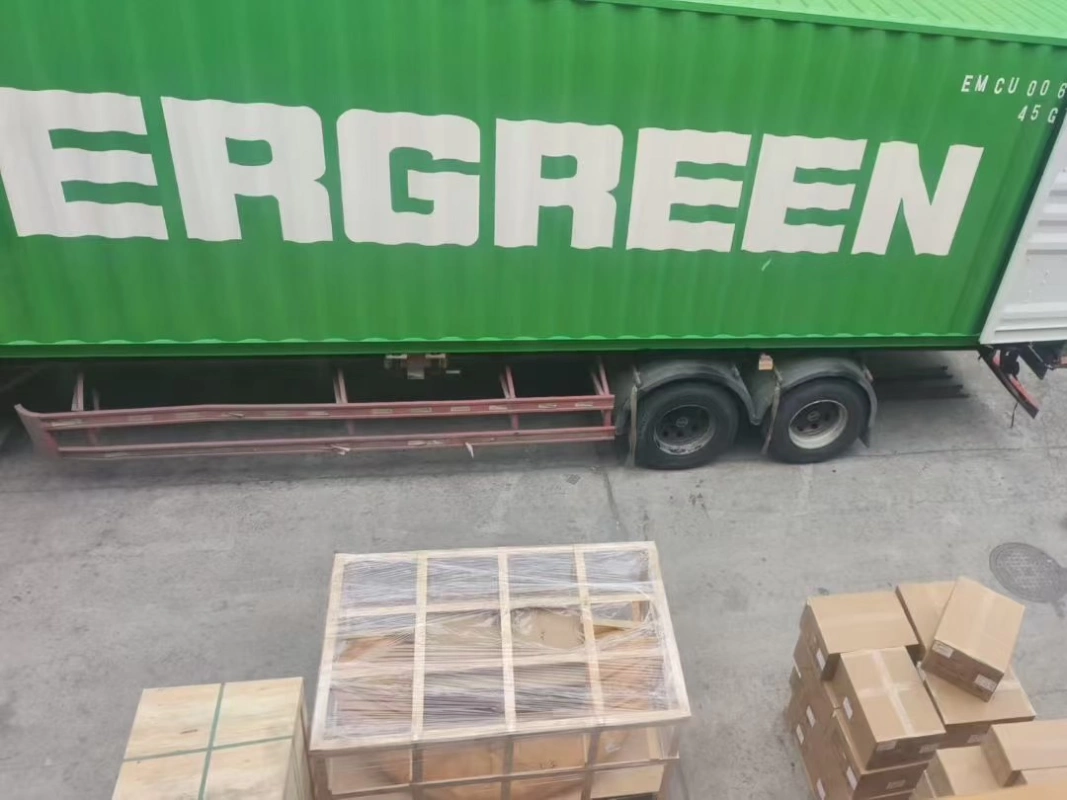 Export logistics for hotel bathroom vanities, showing secure wooden crates and corrugated boxes ready for Evergreen container loading.