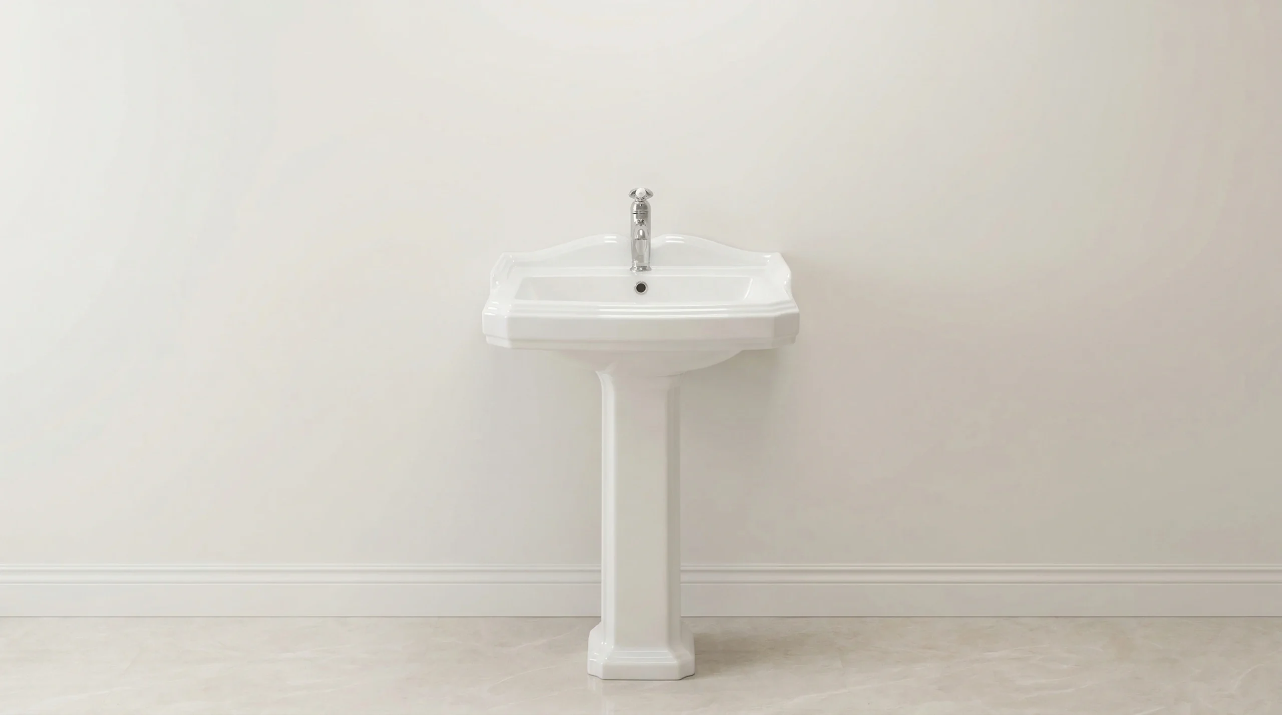 Vintage porcelain pedestal sink manufactured for cost-effective hotel bathrooms