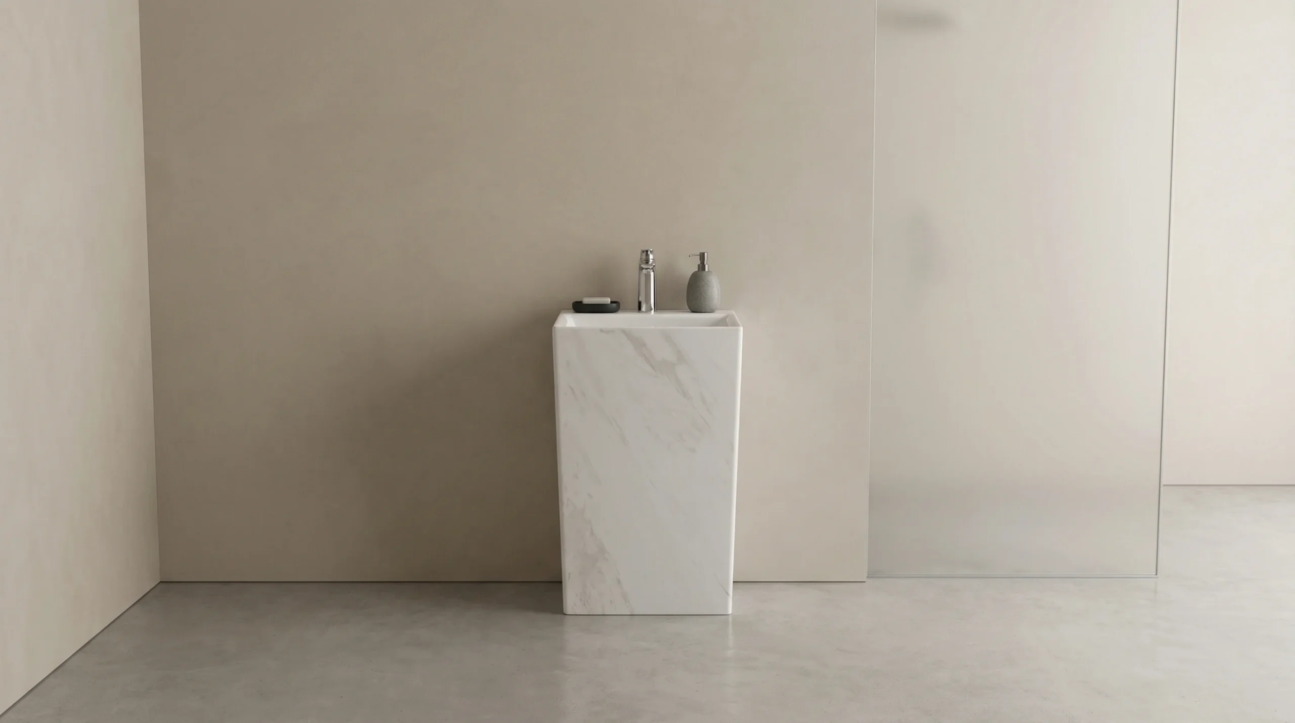 Small ceramic pedestal sink designed for compact hotel guest rooms