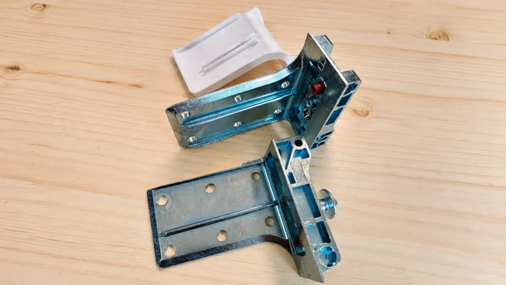 Heavy-duty steel mounting brackets for floating vanities, providing secure structural wall support for hotel bathroom projects.